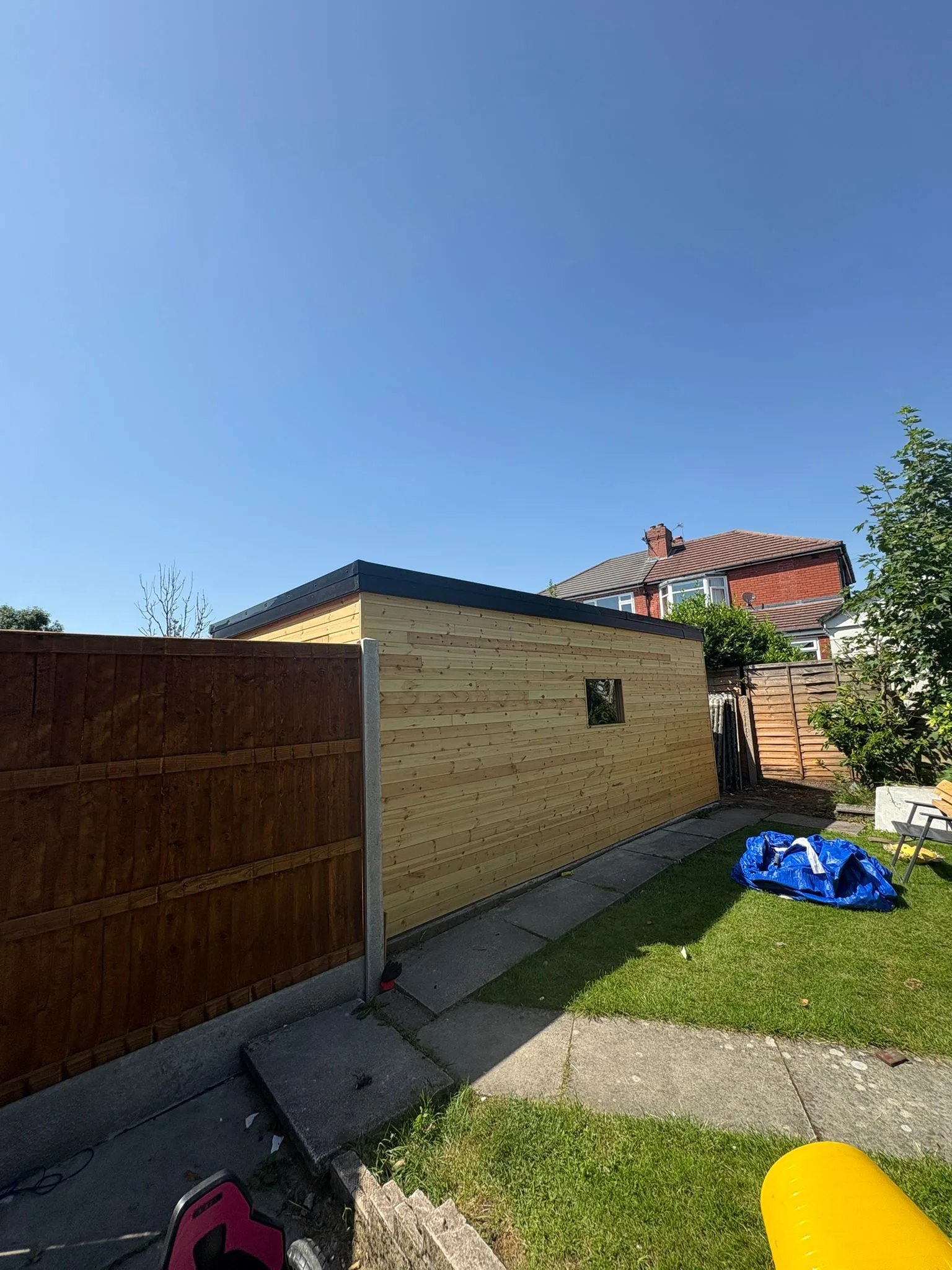 Timber outbuilding with horizontal cladding by LDG Joinery LTD