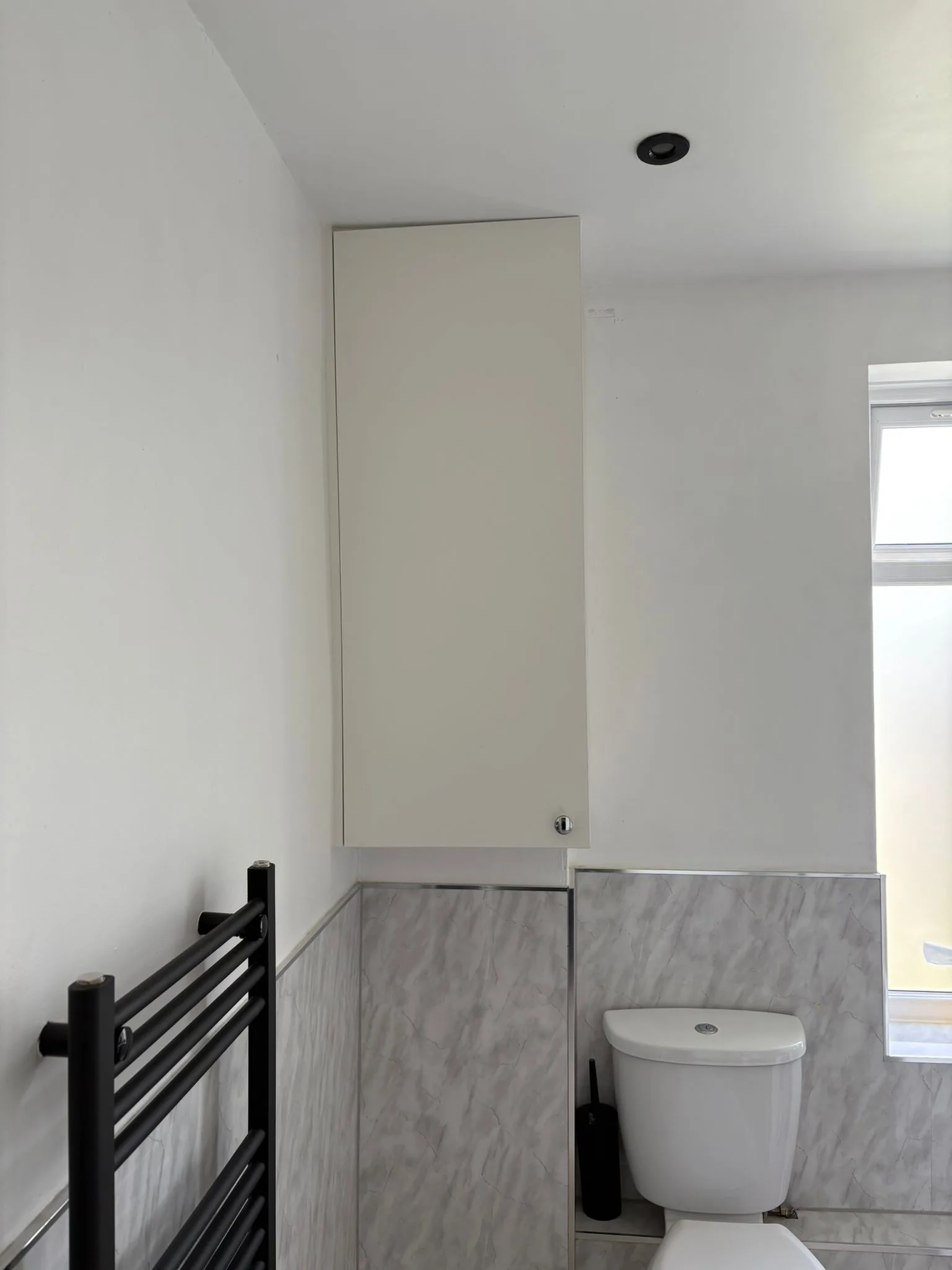 Fitted bathroom storage cupboard by LDG Joinery LTD